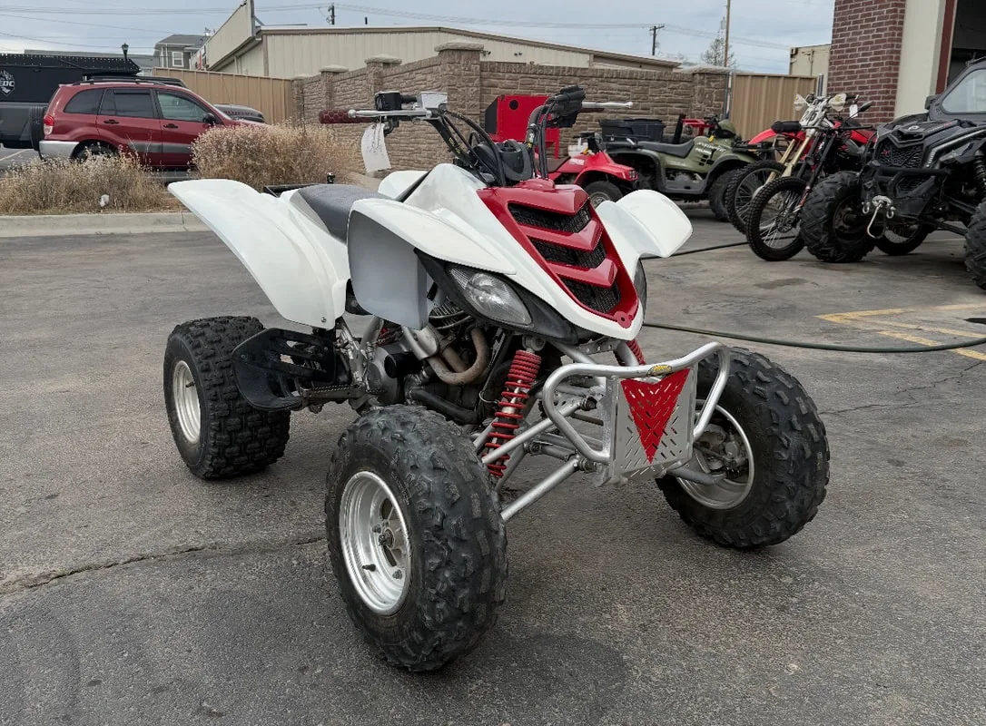 Yamaha Raptor sport ATV outside the shop after service